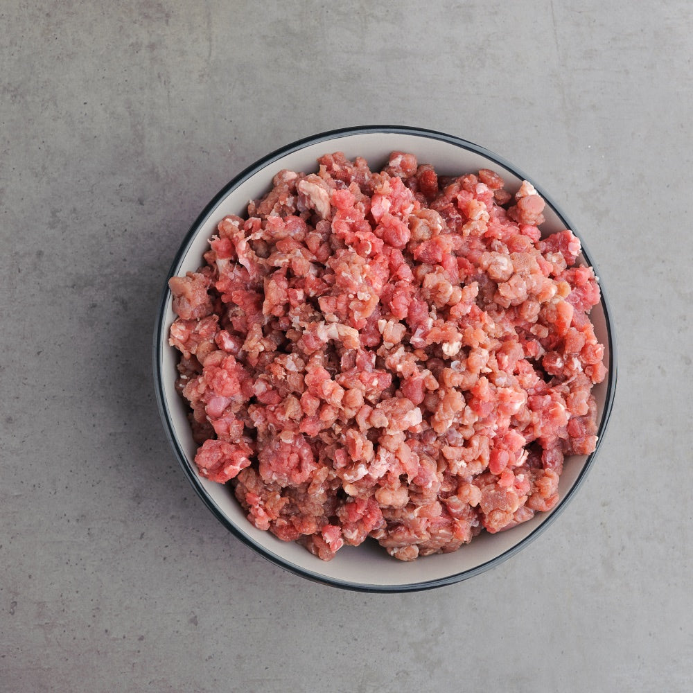 Can a dog eat raw ground beef best sale